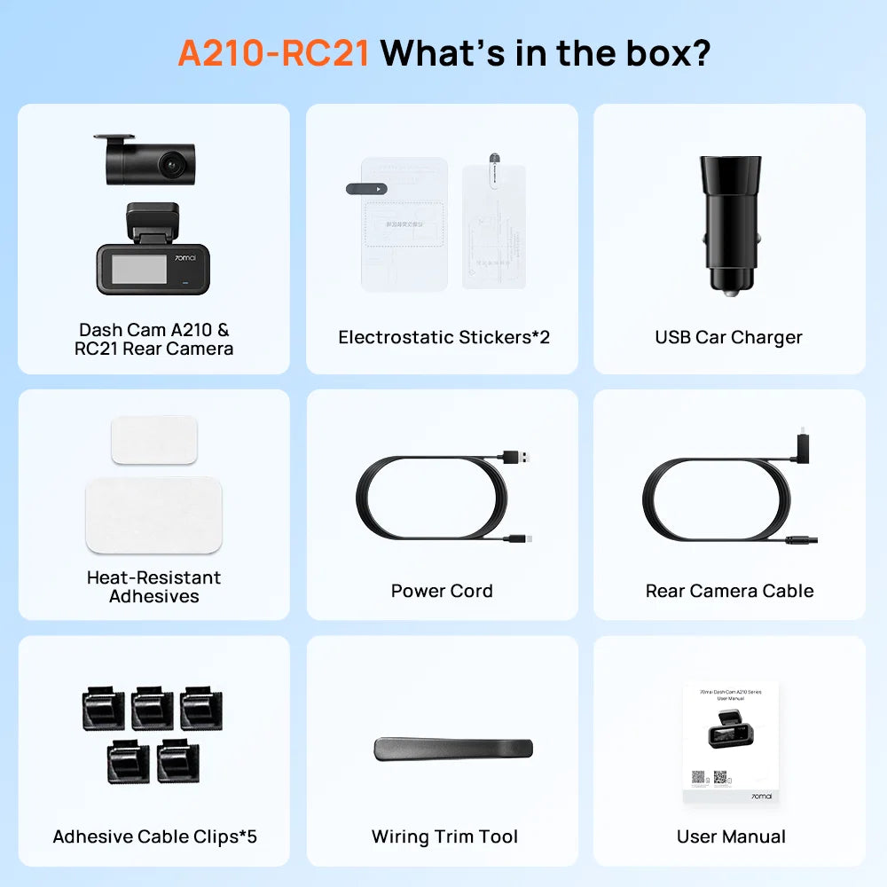Dashcam box contents: front camera, rear camera, USB charger, cables and adhesives