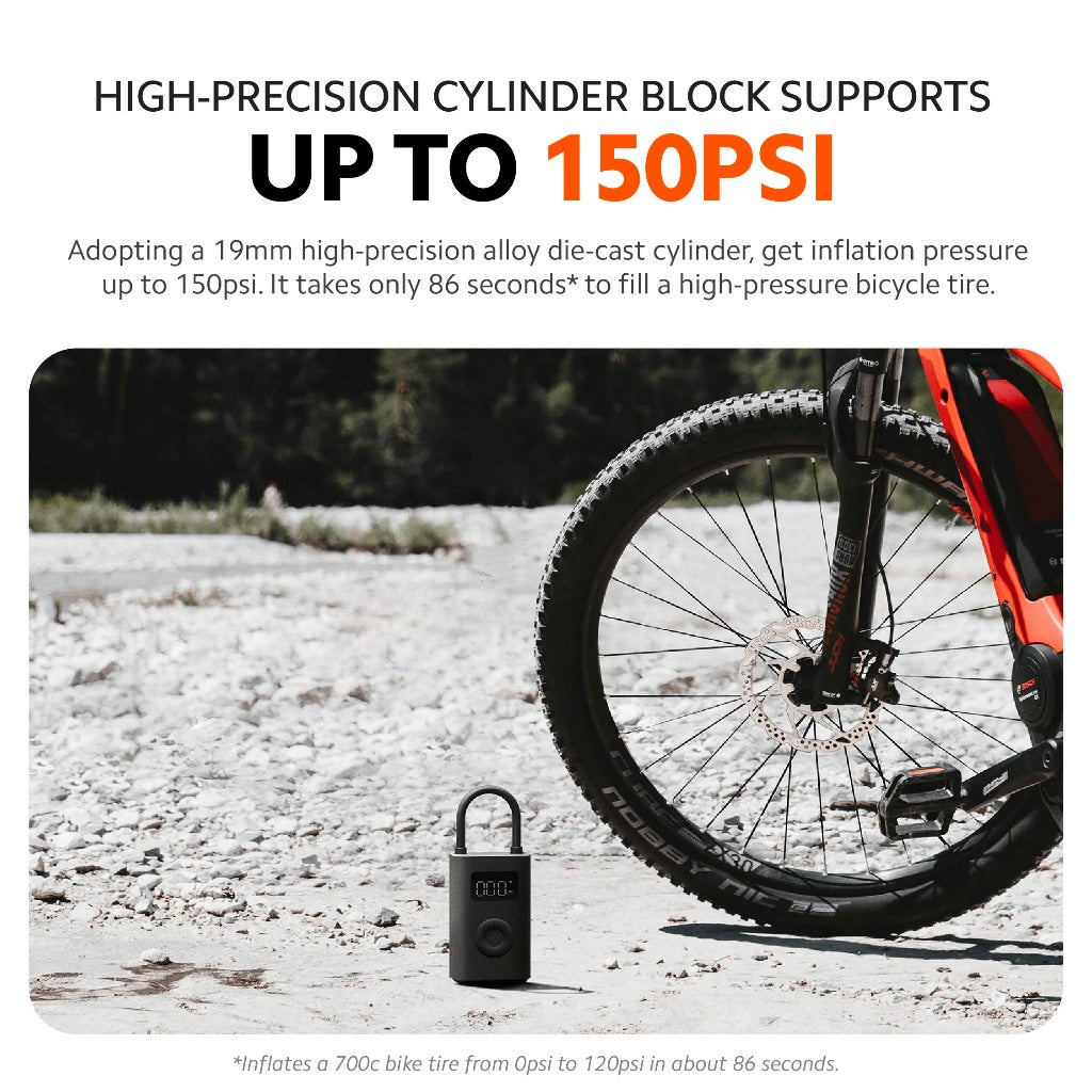 Small portable air compressor with nozzle for inflating bicycle tires, black