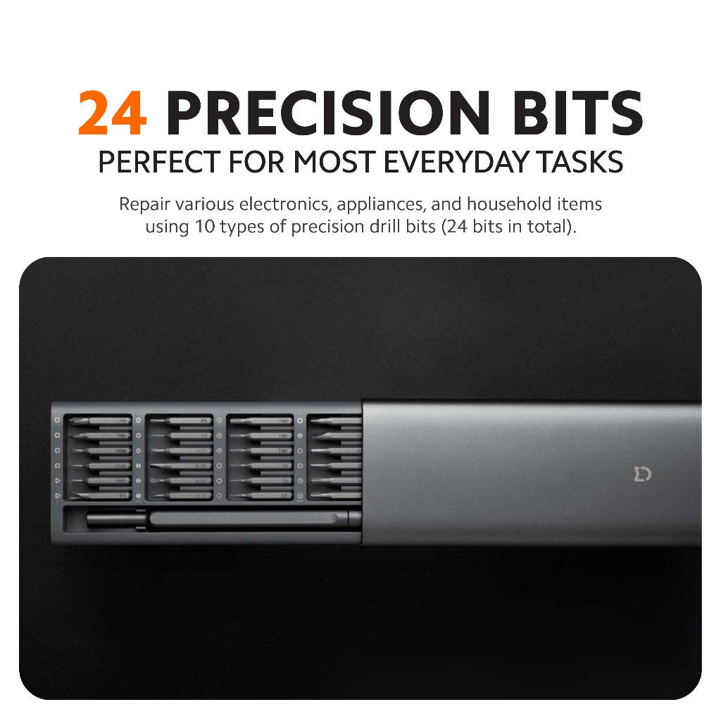 Precision screwdriver with multiple drill bits stored in black tray case