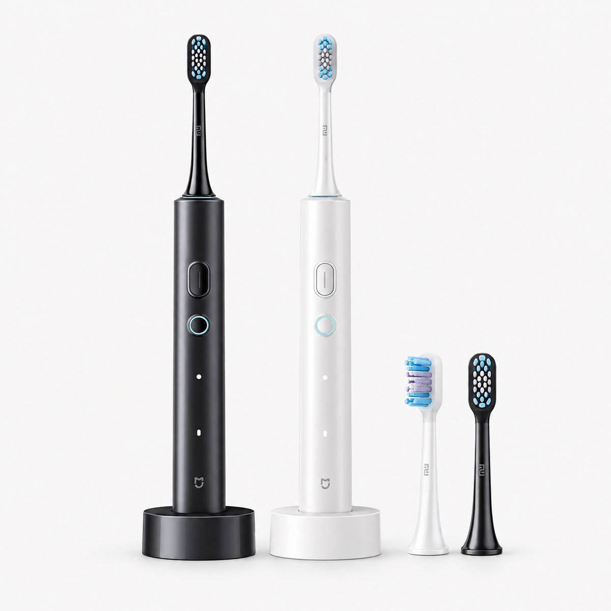 Xiaomi T501 electric toothbrushes: dark grey and white handles with brush heads