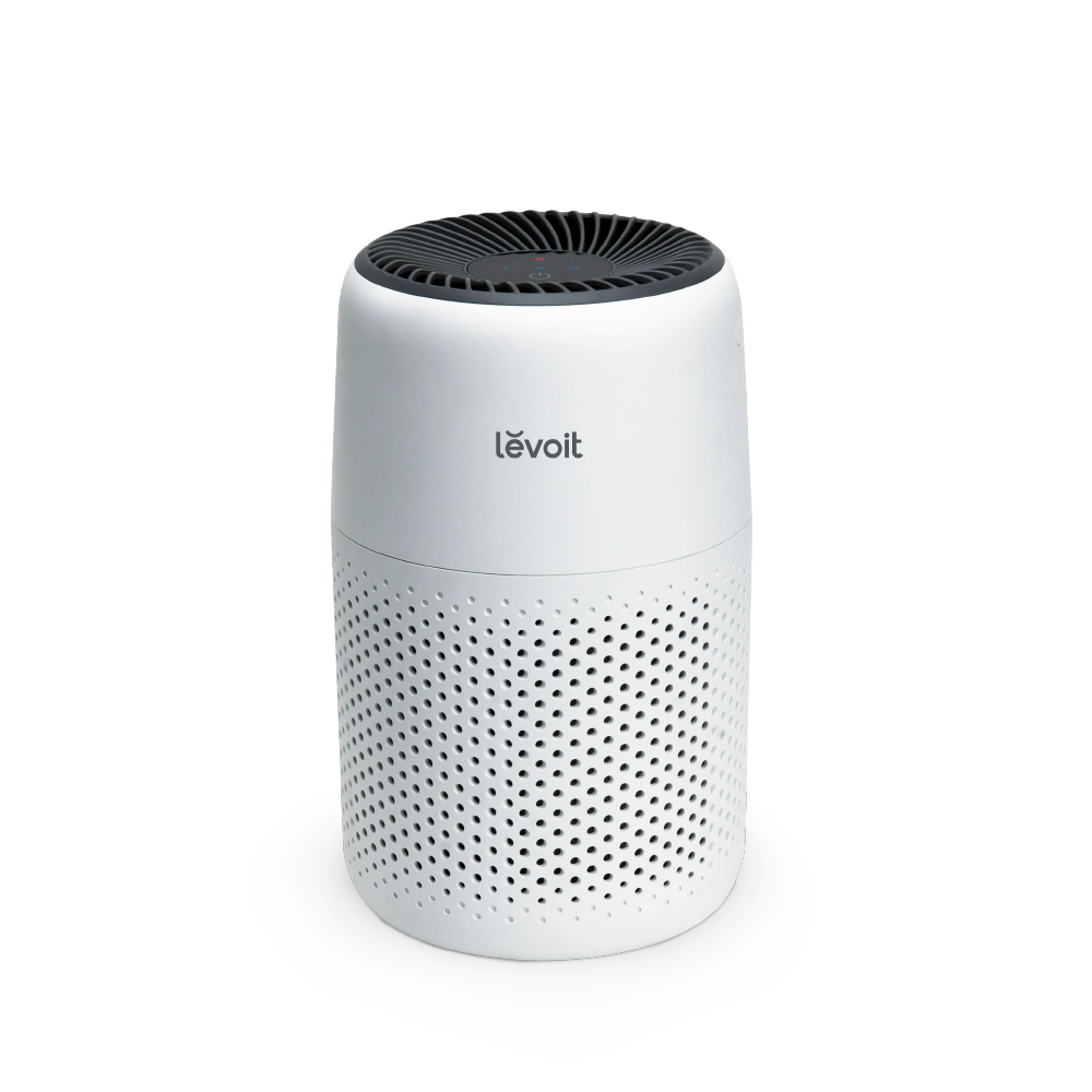 Levoit Core Mini air purifier, white cylinder with top vent and perforated sides