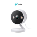 TP-Link TL-Tapo C120 camera front view on base, white housing and black lens ring