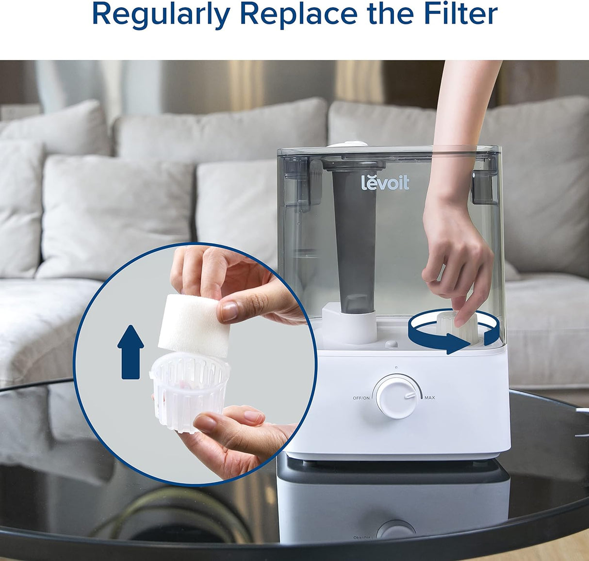 Hands replacing Levoit top-fill humidifier replacement filter sponge