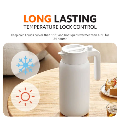 White insulated kettle on a table with blue and sun temperature icons