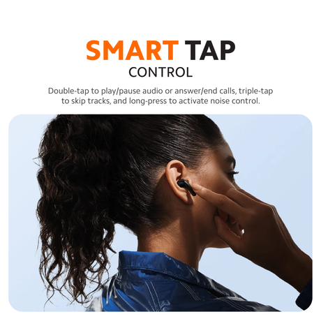 White wireless earbud in a woman's ear for touch control playback