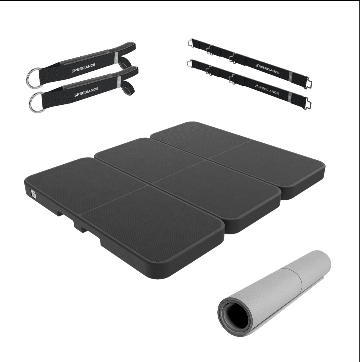 Pilates set with black segmented mat, gray mat roll, and black resistance bands