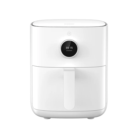 White countertop air fryer with digital timer and pull-out basket