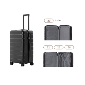 Black hard-shell 20-inch luggage with telescopic handle, spinner wheels, and front divider