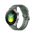 Xiaomi Watch 5 smartwatch with green silicone band and round display