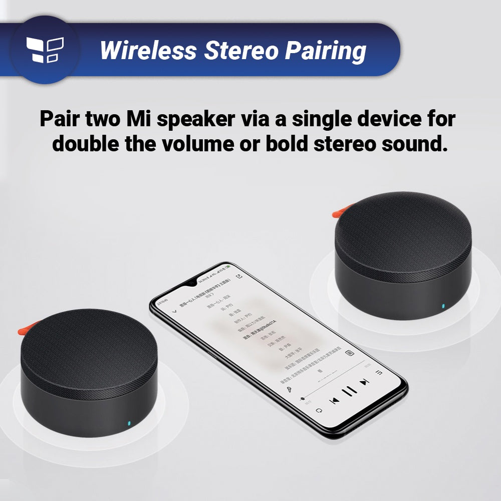 Wireless stereo Bluetooth speaker pair, two round black units with orange handle loops