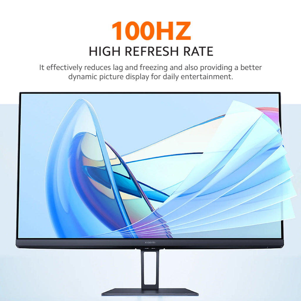 Desktop LCD monitor on a minimal stand showing a dynamic blue abstract wallpaper