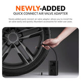 Air compressor with quick-connect valve adapter and nozzle, held beside tire