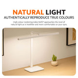 White LED desk lamp with long head for natural, true-color lighting.