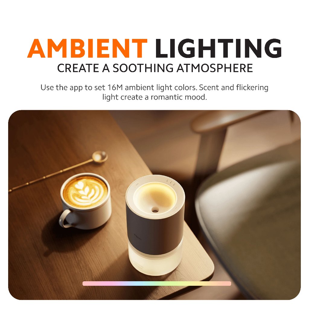 Xiaomi smart scent diffuser on a desk with warm glowing indicator light