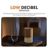 Xiaomi smart scent diffuser on tabletop with warm ambient lighting at night