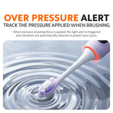Purple electric toothbrush with pressure-alert light, bristle head in water