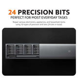 Precision screwdriver with multiple drill bits stored in black tray case