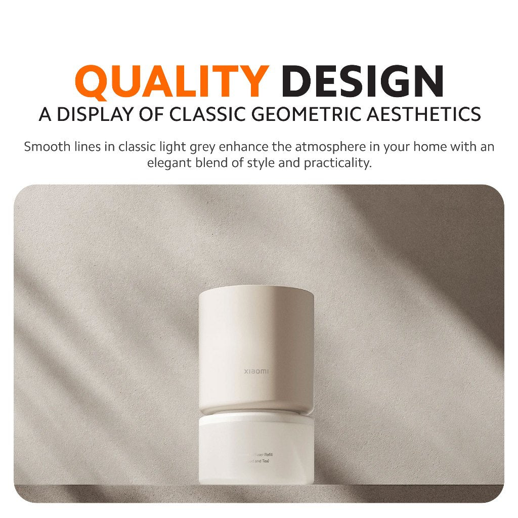Compact Xiaomi smart scent diffuser, two-part cylindrical design with top nozzle