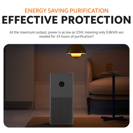White air purifier standing on floor with front grille and circular logo display