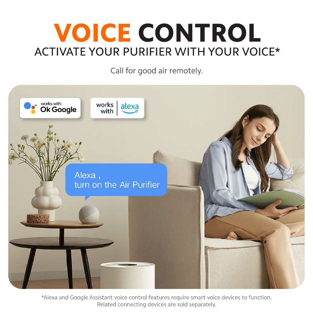 White compact air purifier in living room for voice control operation.