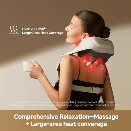 Neck and shoulder massager on a person’s shoulders with illuminated heat areas