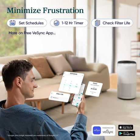 White air purifier with top vent grille next to a smartphone showing scheduling