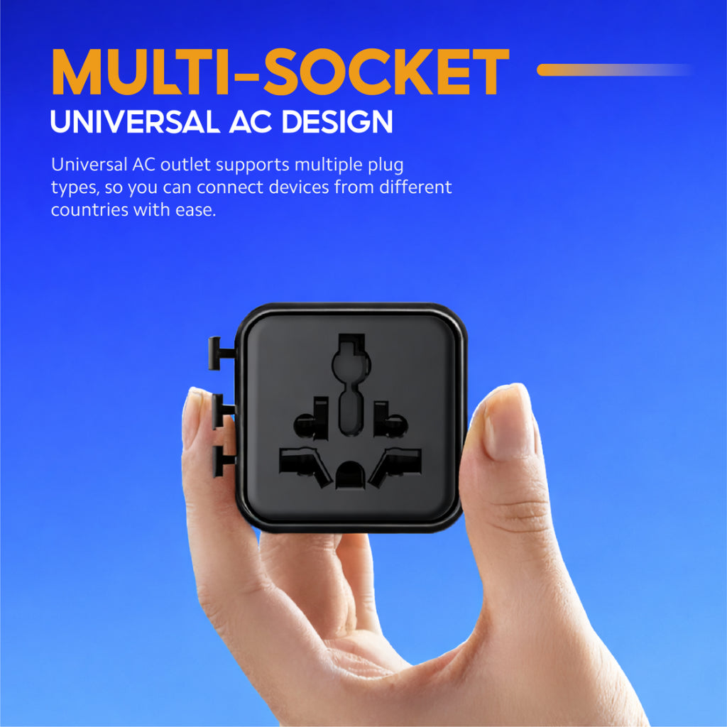 Black multi-socket universal AC adapter held in hand, plug connections on front