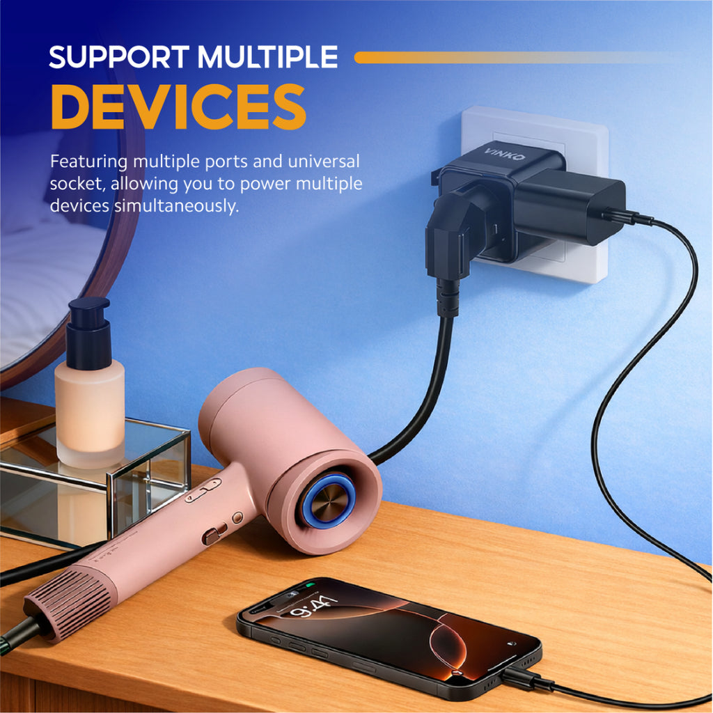 Universal travel adapter with multiple ports for powering devices via connected cable