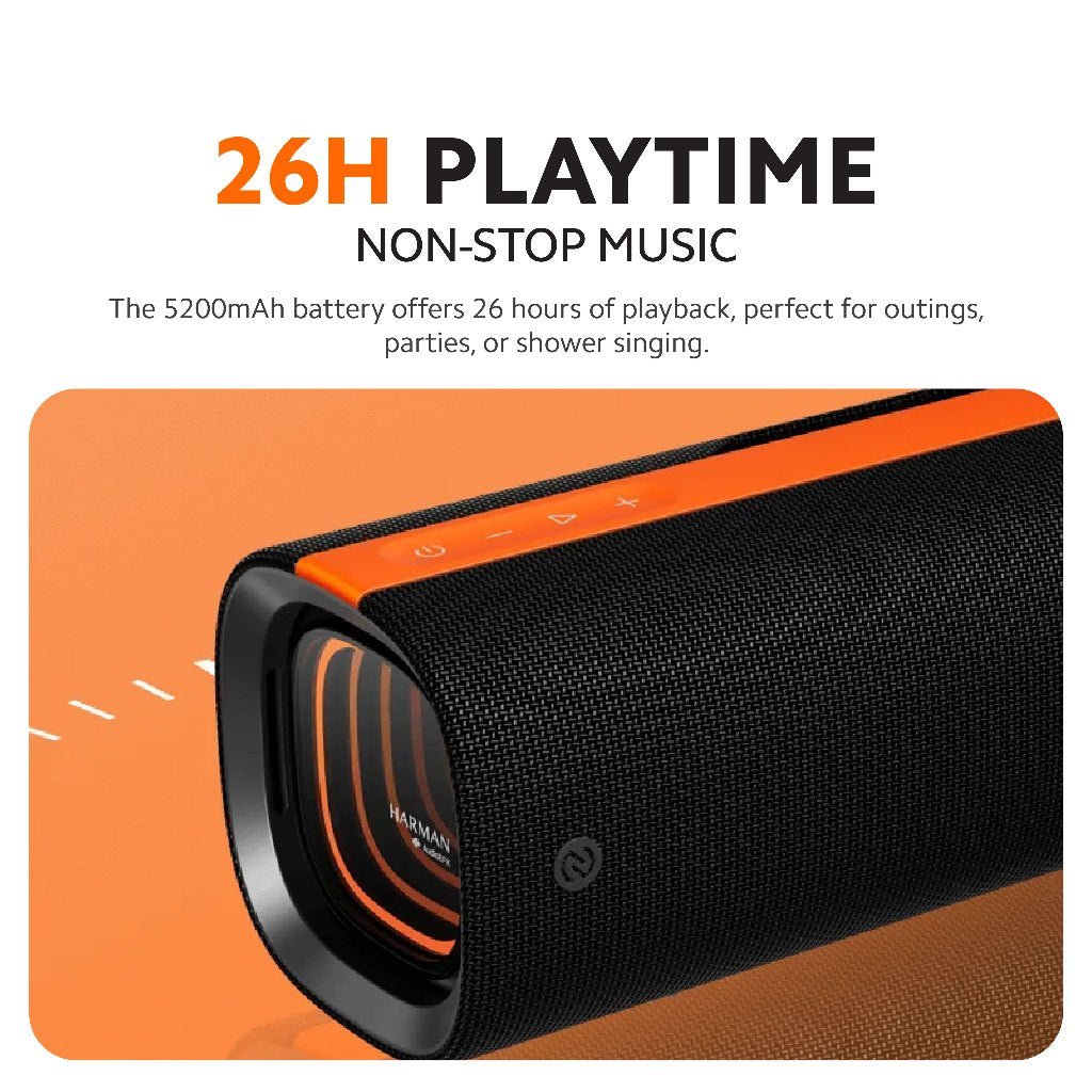 Black Bluetooth speaker with orange trim and glowing speaker-ring bass ports
