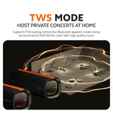 Black Bluetooth speaker with orange trim and glowing rings for TWS mode