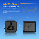 Compact black universal travel adapter with multi-socket outlet and measured size