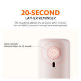 Pink automatic soap dispenser with front sensor window and flashing indicator