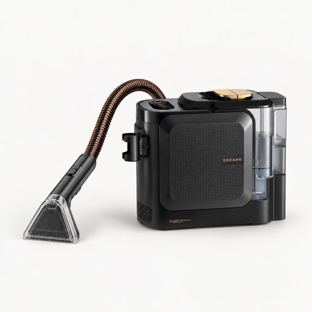 Black portable steam carpet spot cleaner with hose and handheld nozzle attachment