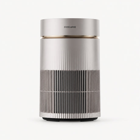 Desktop air purifier, white cylinder with dark vertical grille and top vent.