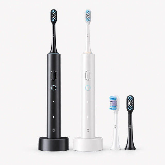Xiaomi T501 electric toothbrushes: dark grey and white handles with brush heads