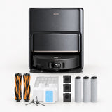Black robot vacuum dock with mop pads, brushes, filters, and accessory kit