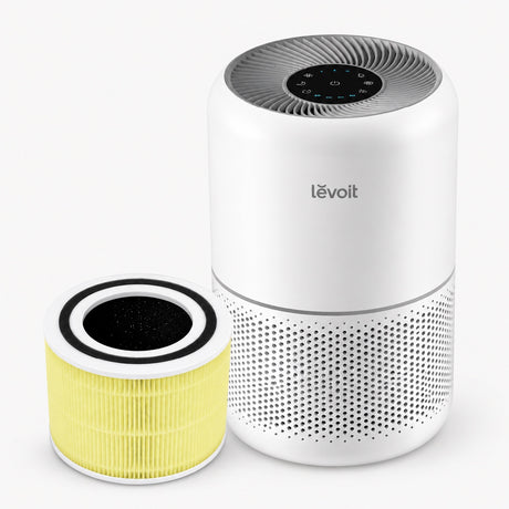 White air purifier with touch control top and extra yellow filter cartridge