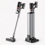 Cordless stick vacuum with charging dock, silver and black, handheld canister.