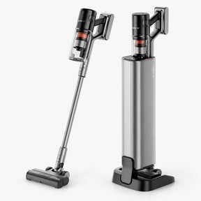 Cordless stick vacuum with charging dock, silver and black, handheld canister.