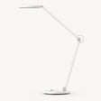 White LED desk lamp with long articulated arms and oval base, adjustable head
