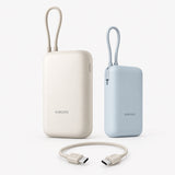 Tan power bank with integrated charging cable, compact rectangular design