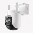 Outdoor security camera with white housing, black lens module, and two antennas