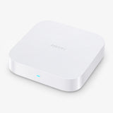 White smart home hub with blue status light