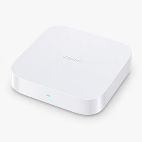 White smart home hub with blue status light