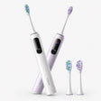 Set of electric toothbrushes with purple handles, white bodies, and blue bristle heads