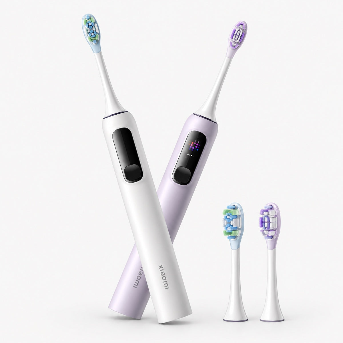 Set of electric toothbrushes with purple handles, white bodies, and blue bristle heads