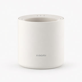 White Xiaomi smart scent diffuser with top controls, cylindrical aroma device