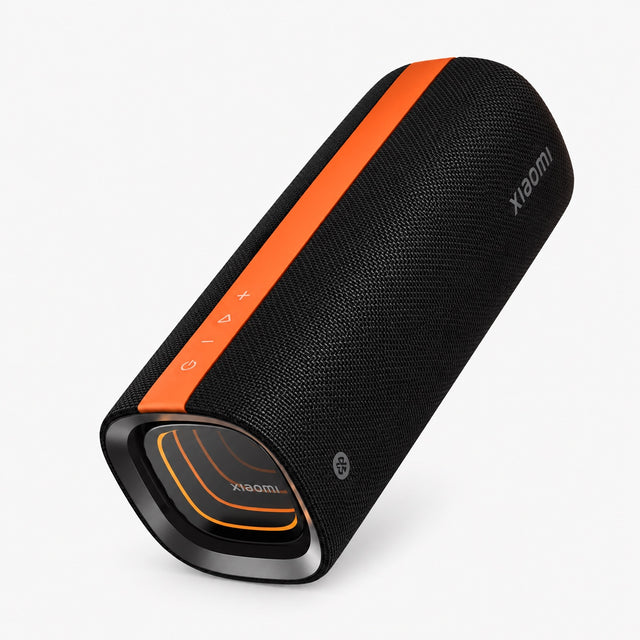 Black cylindrical Bluetooth speaker with orange side stripe and front grille