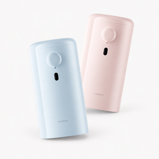 Automatic soap dispenser, pink and blue bodies with front sensor windows