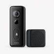 Black smart doorbell camera and speaker chime unit with lens and call button